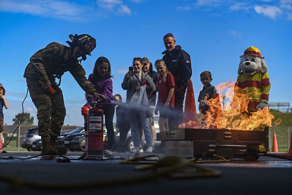 Families visiting a fire station open house